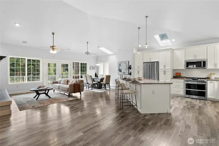 Light & Bright living room with ceiling fans