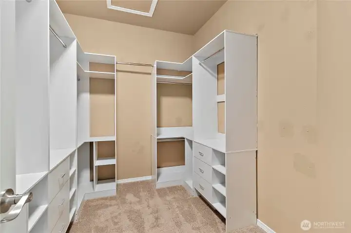 Primary walk-in closet with storage system