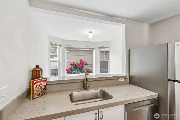 Kitchen with quartz countertops and Stainless Steel appliances