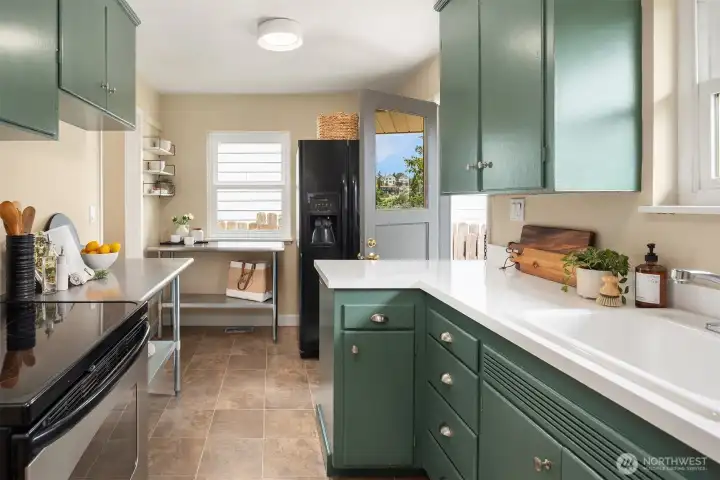 Freshly painted cabinets and a resurfaced countertop gives a fresh appeal.