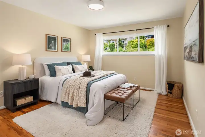The primary bedroom easily handles a king sized bed with lots of room to spare.