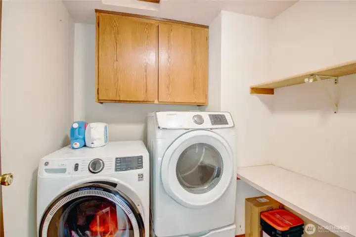 Laundry room just off hall near entrance of the home. Laundry room just off hall near entrance of the home.
