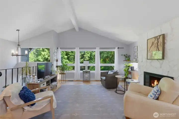 Upstairs living room with large picture windows Upstairs living room with large picture windows