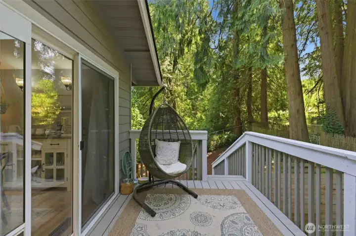 Slider takes you to the dining room or take the stairs down to backyard. Slider takes you to the dining room or take the stairs down to backyard.