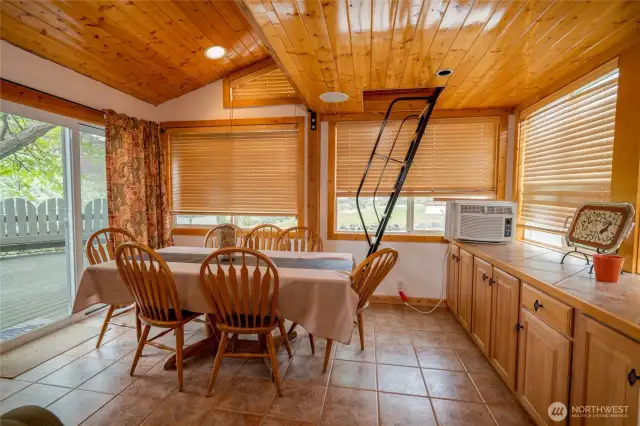 Ladder leads to bunk above dining area, can sleep 2+