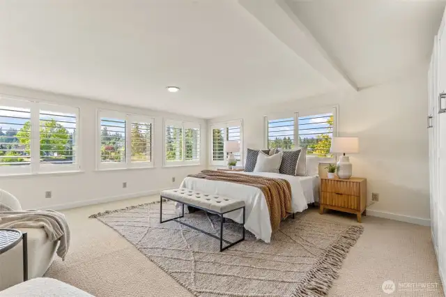 The owner's suite is enhanced with new plantation shutters and a walk in closet!