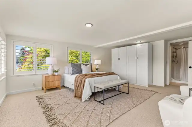This primary suite also enjoys a private primary bathroom, and affords an extra wardrobe closet, should you need one!