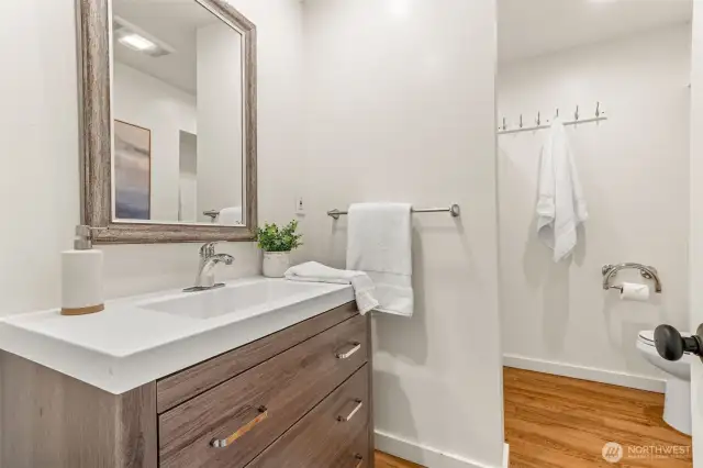 the main bathroom has been updated, and doubles as a great powder room, too!