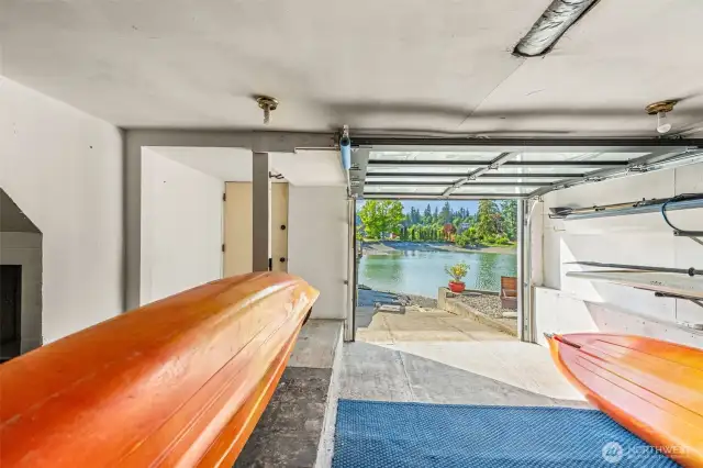 We call this a boathouse, but even if it's a boat garage to you, it's dynamite! It holds so much, and has direct access to the water!