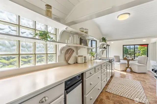 The vaulted ceilings begin here - and extend into the cozy eating nook!