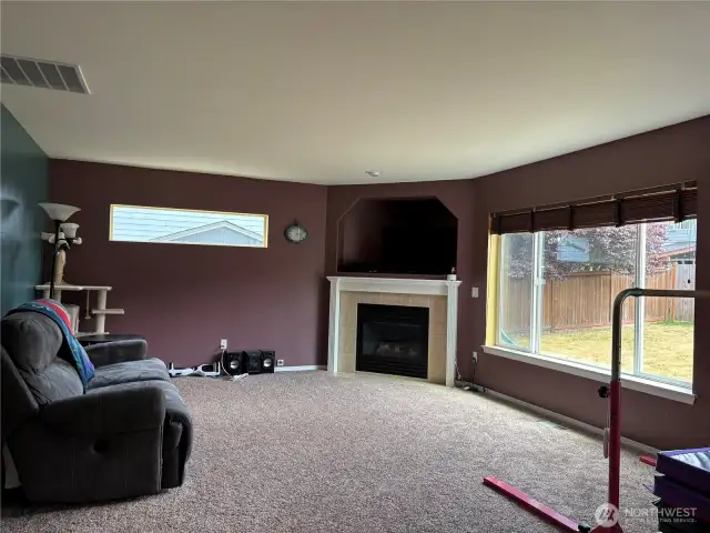 Large family room off kitchen with gas firepace