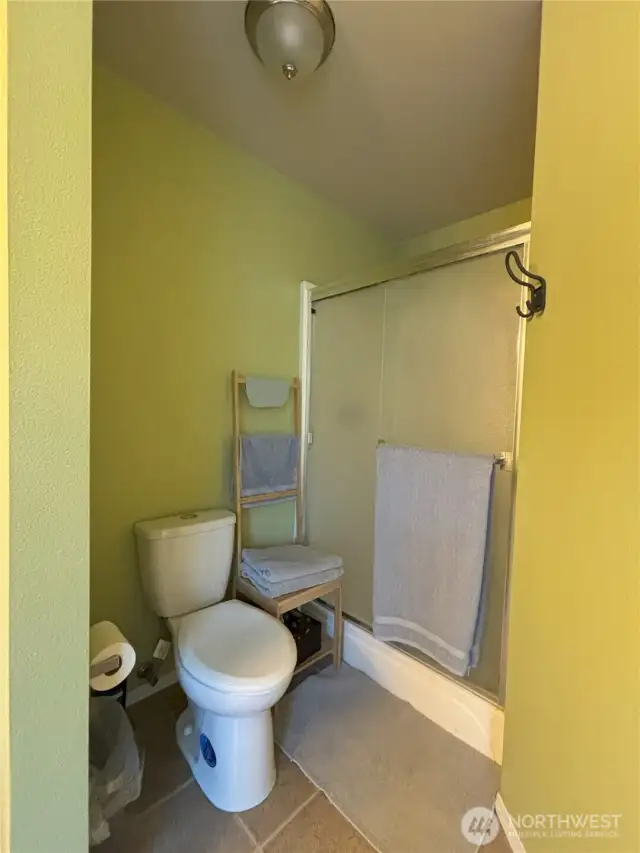 5-piece bathroom off of main bedroom with separate shower.