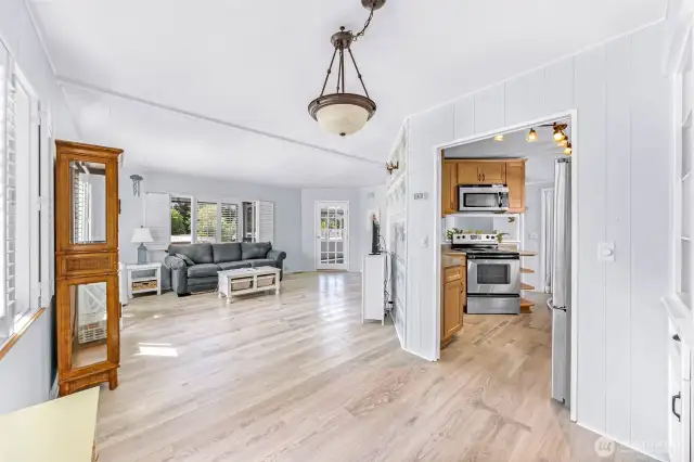 Dining room showing living room and kitchen area
