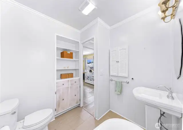 Primary bathroom looking into primary bedroom