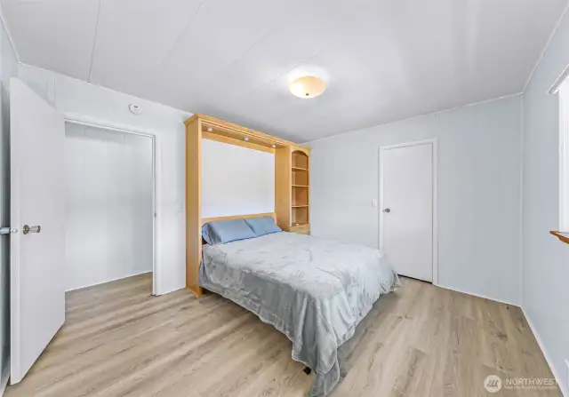 2nd bedroom with opened queen sized murphy bed