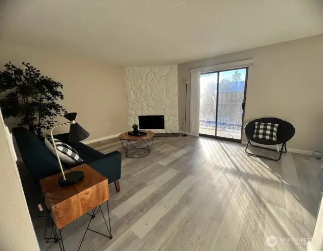Cozy Living Room with Wood burning FP; Slider to Patio