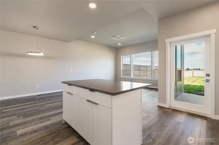 Door to right leads to covered patio and backyard