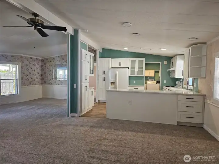 Kitchen has massive storage! Notice the pantries to the left and next to the fridge!
