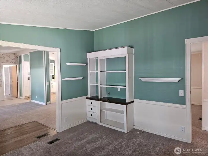 Den or office or formal dining room off of the living room