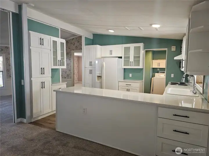 Pantry to the left and a counter perfect for a coffee bar!