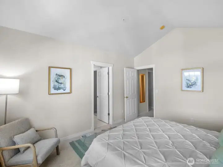 Main bath entrance facing bed