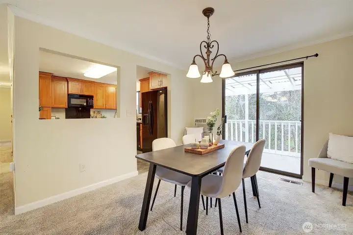 Dining room with sliding doors to upper deck