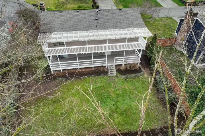 Aerial view of back yard and back of house.