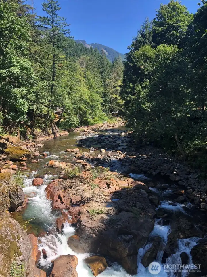View east from community bridge approximately 50 ft from property.