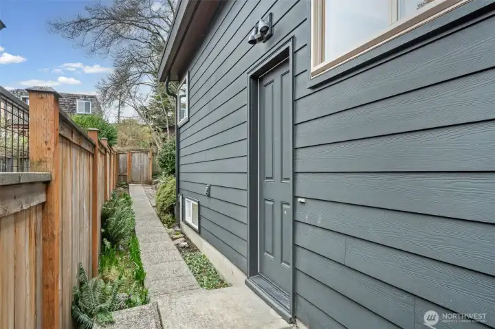 Private exterior entrance to the lower-level ADU offers seamless access and independence, ideal for guests or income potential. This thoughtfully designed space previously generated $2,800 per month in rental income, presenting a compelling investment opportunity.