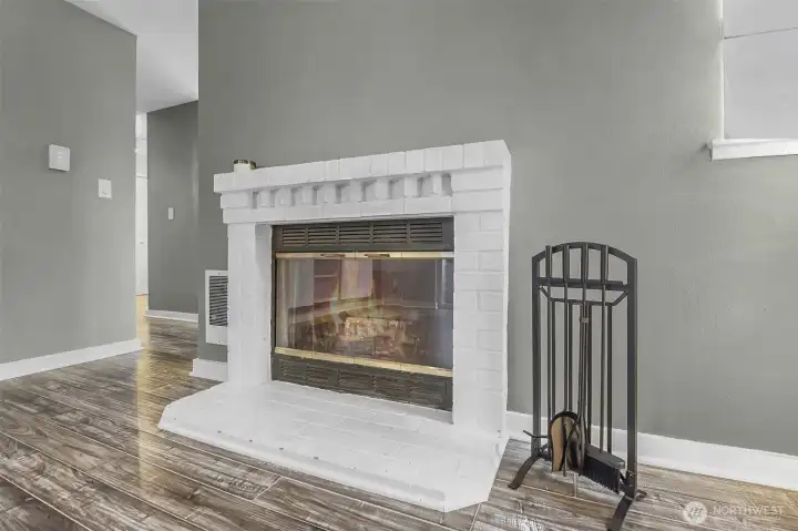This wood-burning fireplace will warm you up during the cool months. The HOA checks fireplaces annually to ensure their safe use.