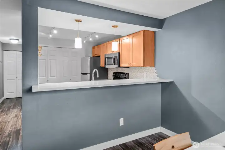 Looking back to the kitchen from the dining area. You can easily place bar stools here.