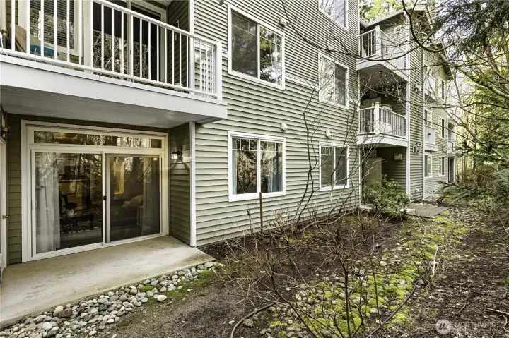 Step outside to your private patio overlooking a lush greenbelt setting. With no back neighbors, this outdoor space feels peaceful and secluded.