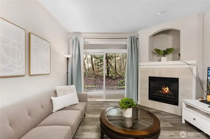 The cozy natural gas fireplace creates an ideal gathering space on cool Pacific Northwest evenings.