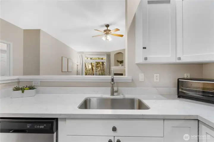 The kitchen flows seamlessly into the living and dining areas, keeping everyone connected.