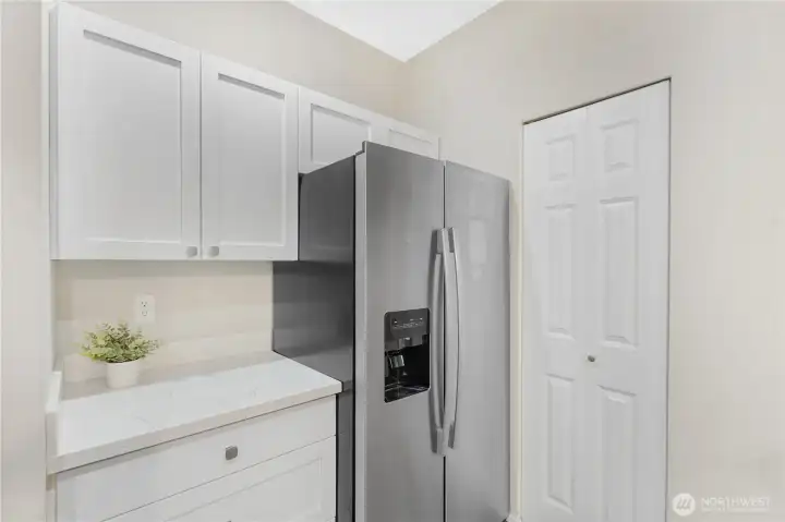 Whether preparing weeknight meals or hosting friends, this space feels open, practical, and welcoming.