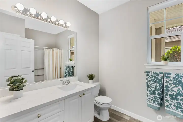 Thoughtfully positioned near the secondary bedroom and main living areas. Perfect for visitors while maintaining privacy for the primary suite. An important feature that enhances overall livability.