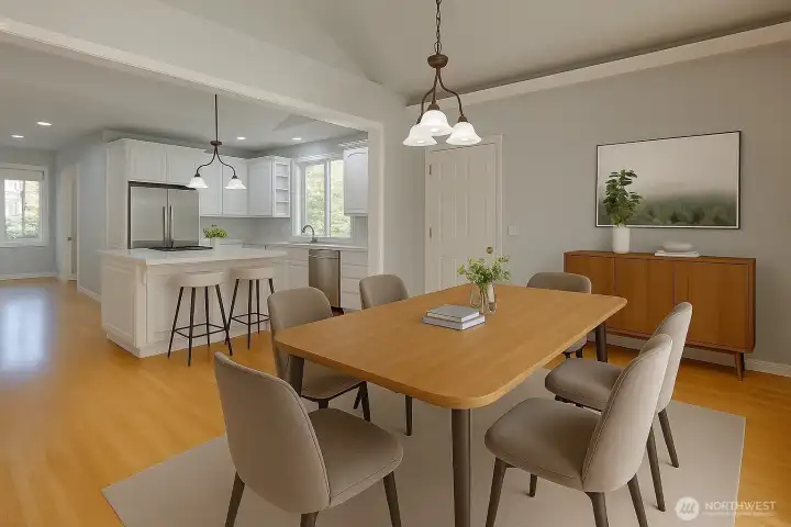 Virtually staged. Gleaming floors flow throughout the kitchen and casual dining area.