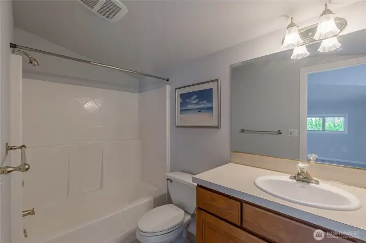 The bonus room includes a full bath for added convenience.