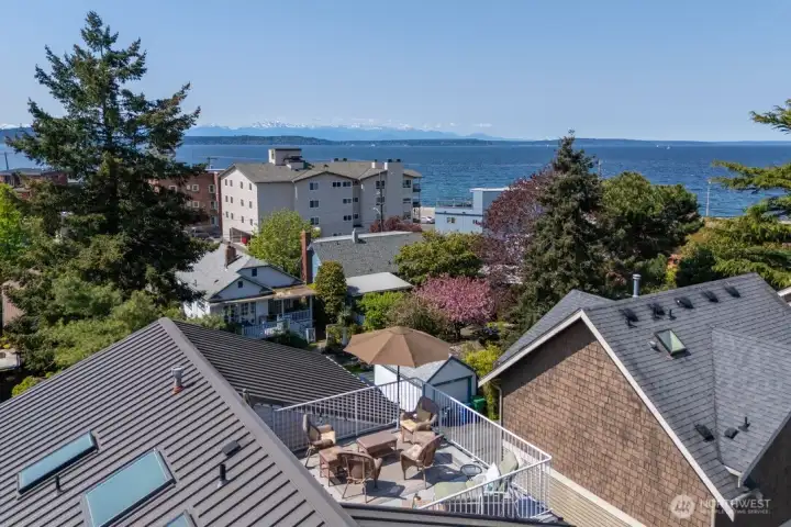 Expansive rooftop deck with sweeping Puget Sound views