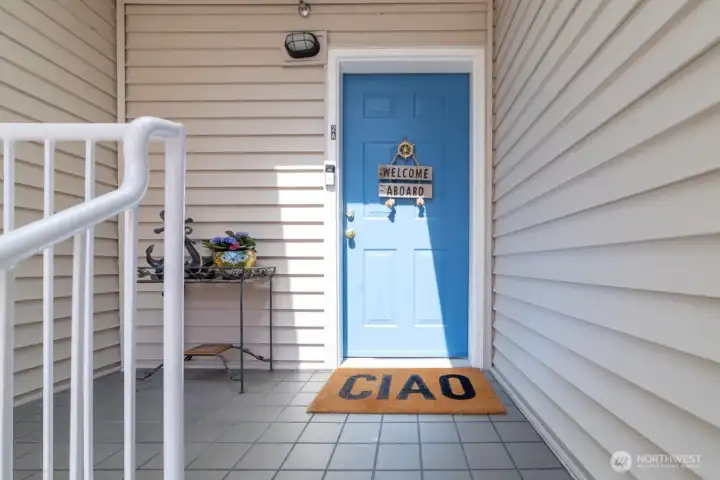 Top-floor end-unit beach bungalow offering light, privacy, and charm