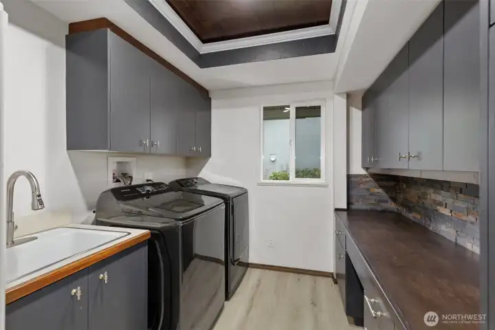 Just off the kitchen, laundry, pantry, storage.