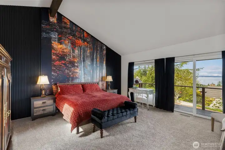 Custom art wall in the primary suite - and slider to take in the view.