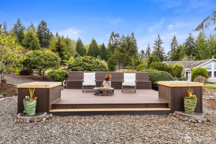 Those gorgeous summer days will beckon you to enjoy your oversize deck with built in firepit.