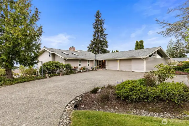 Oversize 2 car garage, ample parking, corner lot.