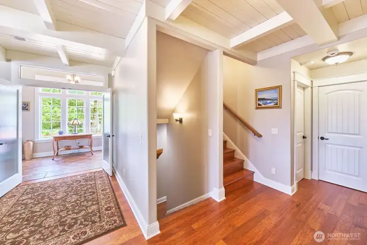 The wide mid-level landing connects all three floors, enhancing privacy while maintaining seamless flow throughout the home.