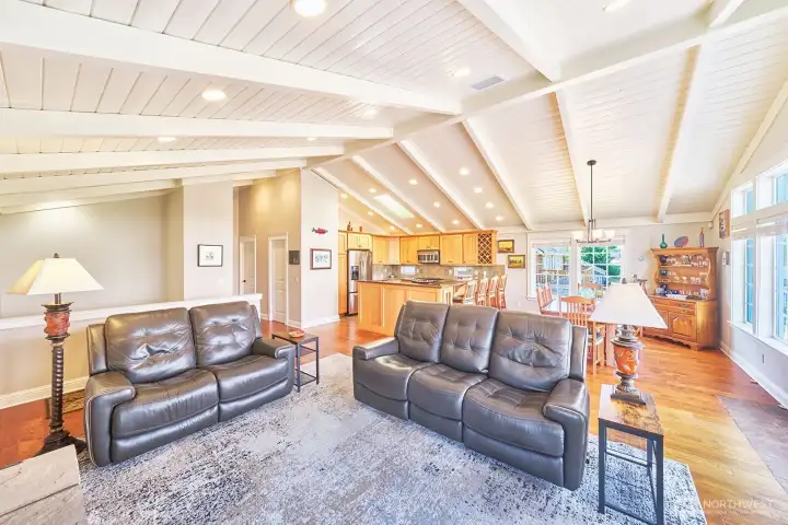 Vaulted ceilings and natural hickory floors set the tone for relaxed, light-filled coastal living.