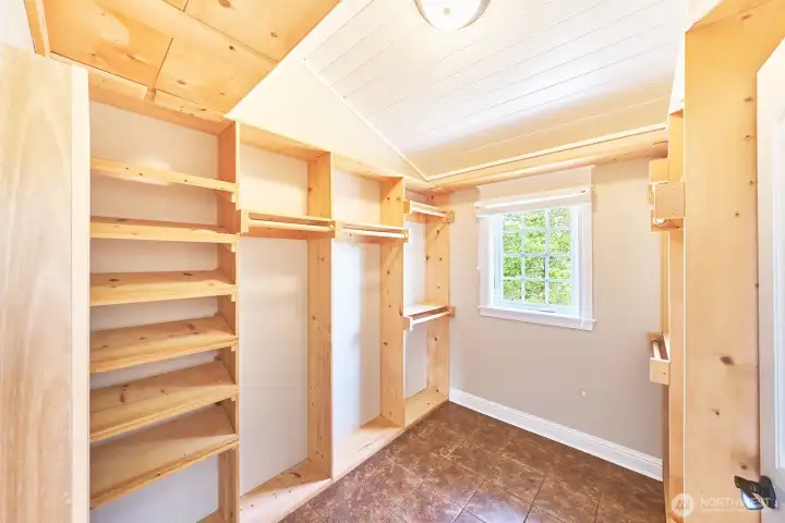 The generous walk-in closet has ample storage and organization space.