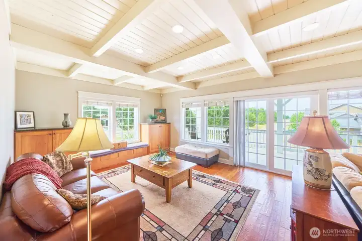 Custom Humtwood hickory buit-ins and hand-scraped hickory floors showcase the builder's commitment to quality craftmanship throughout.