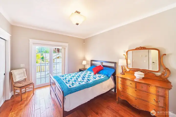 Light-filled and thoughtfully positioned, this bedroom provides easy indoor/outdoor connection.