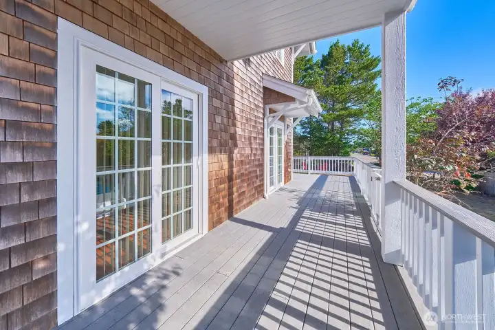 Both bedrooms on this level open to the back deck, extending the living space outdoors.